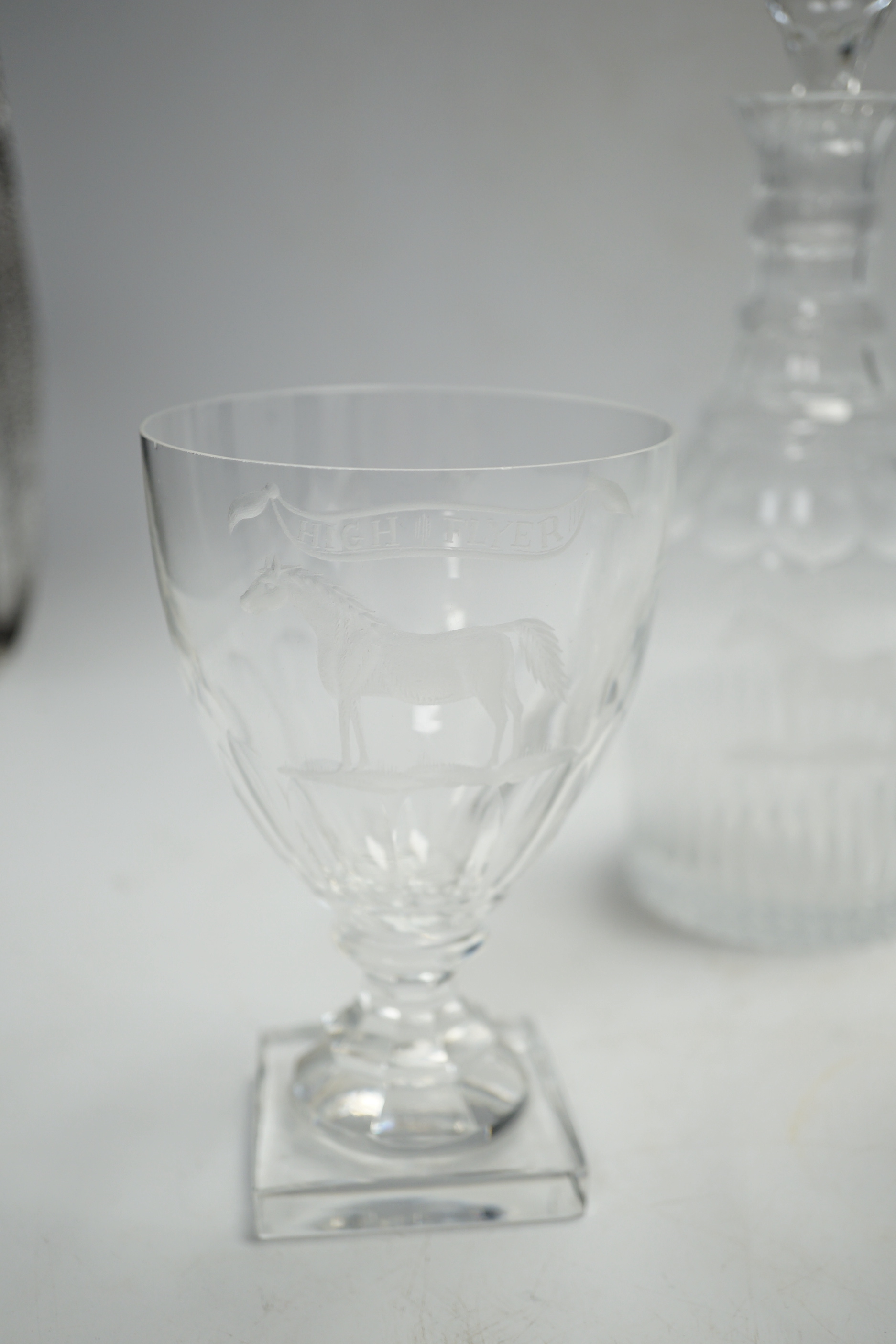 A suite of George III-style drinking glassware, consisting of a pair of decanters and stoppers and three square based rummers, each engraved with an image of the legendary racehorse, High Flyer, decanters 24.5cm, Please